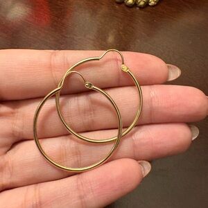 Elegant Gold Hoop Earrings 10kt marked on ear wire , Mint Condition never worn